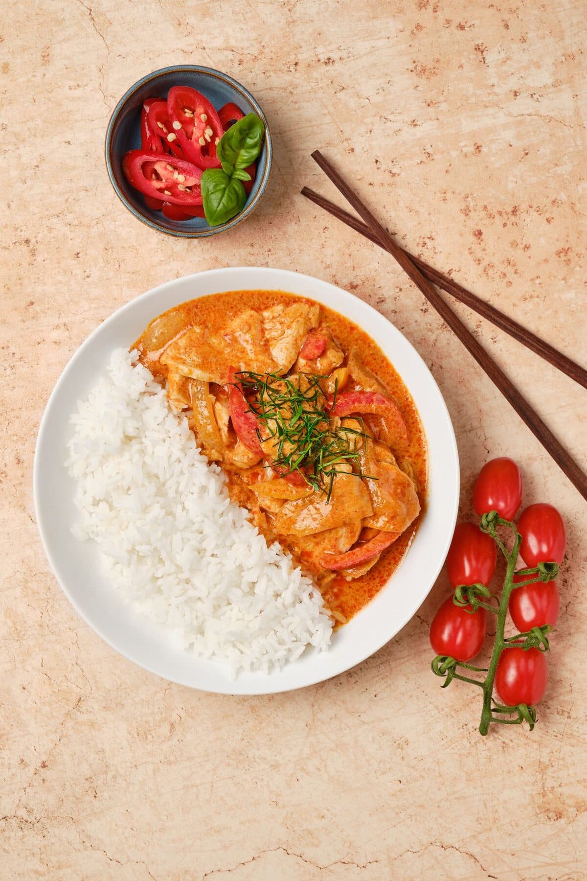 SudZapp Thai red curry with jasmine rice, chillies and tomatoes